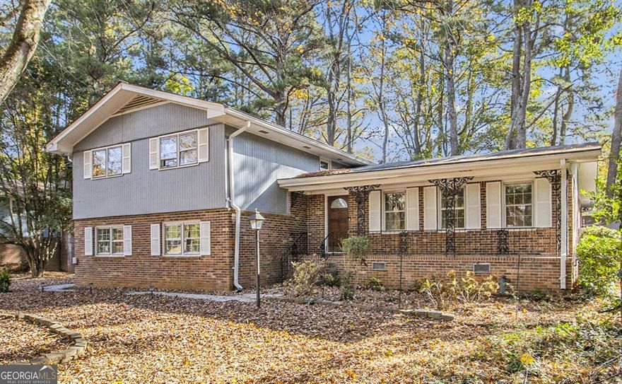 Spacious and versatile, this home offers exceptional living and entertaining space across multiple levels. The main floor features a large family/keeping room addition and a dedicated home office, complemented by a traditional living room, dining room, and a generous kitchen with a bright breakfast area. The lower level includes an additional family room with a cozy fireplace and an expansive sunroom-perfect for relaxing or hosting gatherings year-round. Upstairs, the primary suite offers a walk-in closet and plenty of natural light, while three additional bedrooms-two of which are oversized-provide ample space for everyone. Enjoy the flat backyard ideal for play or gardening, plus a versatile outbuilding/workshop with electricity and a car-sized door-perfect for storage, hobbies, or projects.