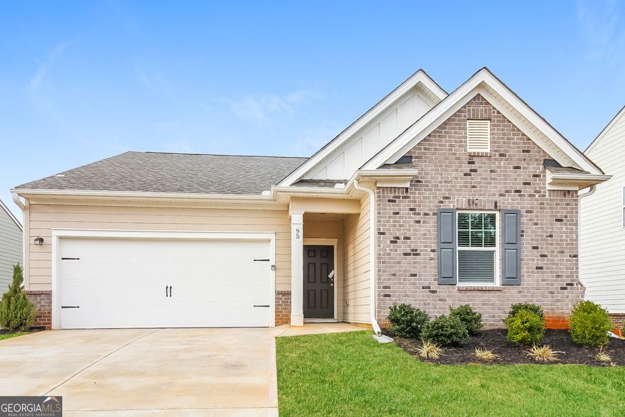 Welcome home to this charming 3-bedroom, 2-bath ranch located in a quiet Covington neighborhood with sidewalks and a welcoming community feel. The open-concept floor plan features a bright living area that flows seamlessly into the dining space and modern kitchen, complete with stainless steel appliances, granite countertops, a center island with bar seating, and a spacious pantry. The primary suite offers a generous walk-in closet and private bath, creating the perfect retreat. Enjoy easy-care luxury vinyl flooring, a level lot, and convenient access to shopping, dining, and major highways. This move-in ready home combines comfort, style, and value-ideal for first-time buyers or anyone seeking one-level living.