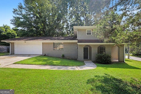 Photo of 940 Michael Drive SW, Atlanta, GA 30349 (MLS # 10851575)
