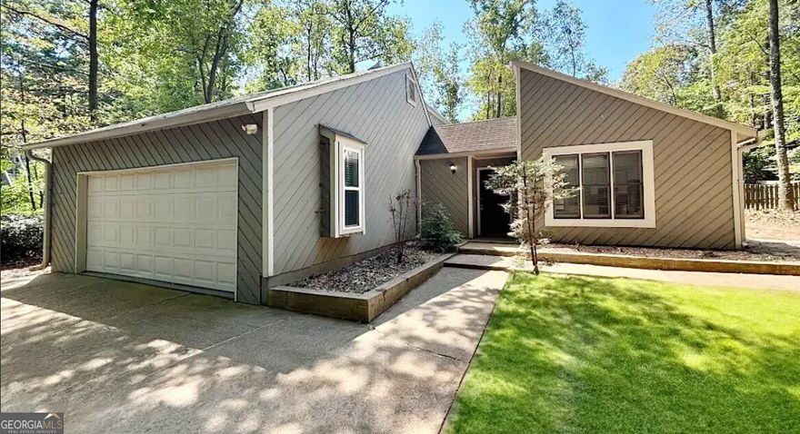 Welcome to 2041 Kramer Way in beautiful Marietta, Georgia!    This charming home is nestled in a quiet neighborhood in Marietta. This 1,624 square foot home features 3 bedrooms and 2 bathrooms on a spacious .47 acre lot.    Step inside to find an open concept living area with plenty of natural light supplied by the courtyard at the center of the home. The kitchen boasts granite countertops and stainless steel appliances.      Out back, enjoy the private, fenced yard - great for summer barbecues or gardening enthusiasts.    Located in the highly-rated Cobb County School District, this home is close to shopping, dining, and recreation at East Cobb Park. Easy access to I-75 makes commuting a breeze.    Don't miss this opportunity to make 2041 Kramer Way your new home! Schedule a showing today.  *Over 30 trees removed. Grass on cover photo added using photoshop*