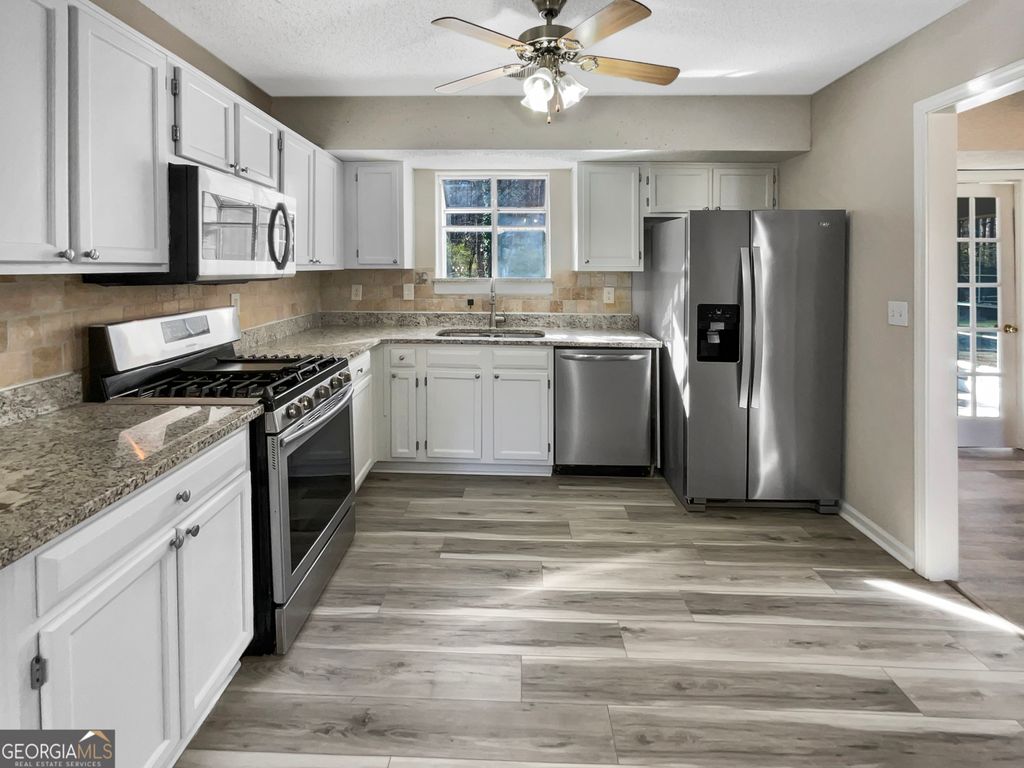 Photo of 2050 Surrey Trail, South Fulton, GA 30349 (MLS # 10658715)