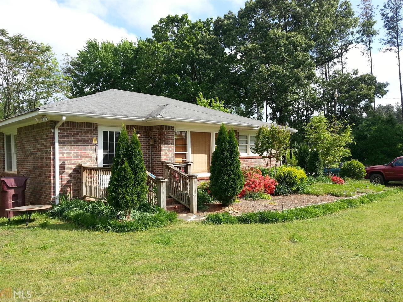Charming home nestled on a 5 acre level lot with tons of privacy! This home is a must see!! Just two bedrooms this home has plenty of space but room to grow, would be perfect for a young couple or someone looking to downsize. Hardwood floors throughout home, tiled bath, cozy family room that is open to breakfast area, and kitchen with plenty of cabinet space. Don't wait too long this home will move fast!!