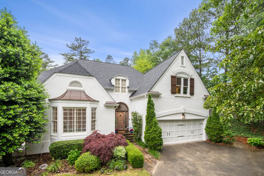 Beautifully Updated Home with Designer Touches, Top Schools & Ideal Location    Welcome to this thoughtfully renovated and lovingly maintained home, nestled in a quiet neighborhood with top-rated schools and unbeatable access to shopping, dining,  Atlanta or Airport. From the moment you arrive, you'll notice the attention to detail and the seamless blend of comfort, function, and modern elegance.    Inside, you'll find a spacious master suite conveniently located on the main level, complete with a luxuriously remodeled master bath Coyour personal spa retreat. Upstairs features new hardwood flooring  and two beautifully updated bathrooms, offering a fresh, timeless feel.    Additional highlights include:    *New roof installed in late 2021  *All electrical circuits updated  *New water heater   *Electric Vehicle Charger (ChargePoint) installed in 2024  *New windows in guest bedrooms upstairs    The exterior was freshly painted in classic white, enhancing curb appeal, while the backyard has been fully remodeled into a private outdoor oasisCoperfect for relaxing or entertaining guests.    This exceptional property combines tasteful upgrades, a versatile floor plan, and a fantastic location. Its the perfect place to call home move-in ready and waiting for you.