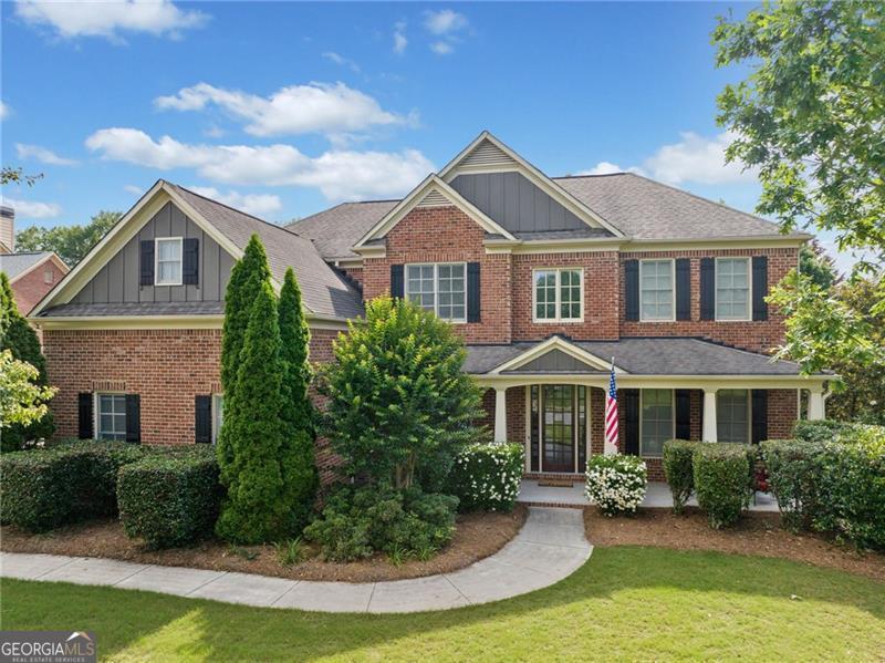 Beautiful Executive Home in the Highly Sought-After Paces Farm Community! Upstairs, unwind in the oversized primary suite featuring a spacious walk-in closet and a peaceful ensuite bath. The generous bonus room with built-ins provides versatile living space and can easily function as a 6th bedroom. Two bedrooms share a Jack-and-Jill bath, while a third has its own private ensuite-perfect for guests, teens, or extended family. At the heart of the home, a spacious kitchen shines with granite countertops, electric double ovens, gas cooktop and a sunlit breakfast nook-perfect for morning coffee or casual meals. Just off the kitchen, the inviting keeping room with a cozy fireplace offers a natural gathering spot for family and friends. A well-appointed mudroom helps keep everyday essentials organized, while the custom-designed laundry room features 42" cabinetry and butcher block counters, blending functionality with rustic charm. Upstairs, retreat to the oversized primary suite with a generous walk-in closet and serene ensuite bath. A large bonus room with built-ins offers endless options-media room, teen lounge, creative studio-you decide! Two bedrooms share a Jack-and-Jill bath, while a third has its own private ensuite, ideal for guests or older children. Out back, enjoy a private, level yard with a privacy fence and spacious patio-perfect for grilling, entertaining, or simply unwinding at the end of the day. A 3-car garage provides ample room for vehicles, storage, or hobbies. Life in Paces Farm means more than just a lovely home-it means being part of a vibrant community. Enjoy a clubhouse, resort-style pool with mushroom feature and toddler splash area, a playground, and a covered patio with outdoor fireplace. From Fourth of July fireworks to Cookies with Santa, the neighborhood's active social calendar creates lasting memories all year long. This is more than a place to live-it's where life happens. Come experience what makes life in Paces Farm so special!