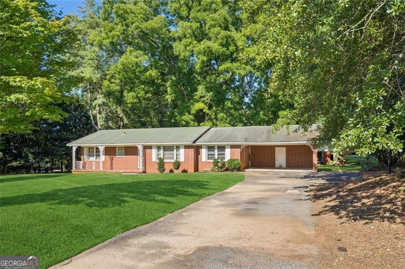 1.46 Acre private home site near downtown Alpharetta & Milton, this property offers a rare opportunity to enjoy privacy and space while remaining just minutes to the area's most desirable destinations. Nestled on quite Cowart Road, the land is surrounded by mature trees, open green space and the charm of Milton's equestrian countryside. Located less than 10 minutes to downtown Alpharetta, Avalon, and Crabapple Market, the setting combines the best of both worlds - a peaceful retreat and easy access to premier dining, shopping, and entertainment. The lot also sits within the highly regarded Summit Hill, Northwestern and Cambridge High School districts. Whether you're seeking a site for a custom home, space for outdoor living, or simply an investment in one of North Fulton's most coveted areas, this property delivers both lifestyle and location.