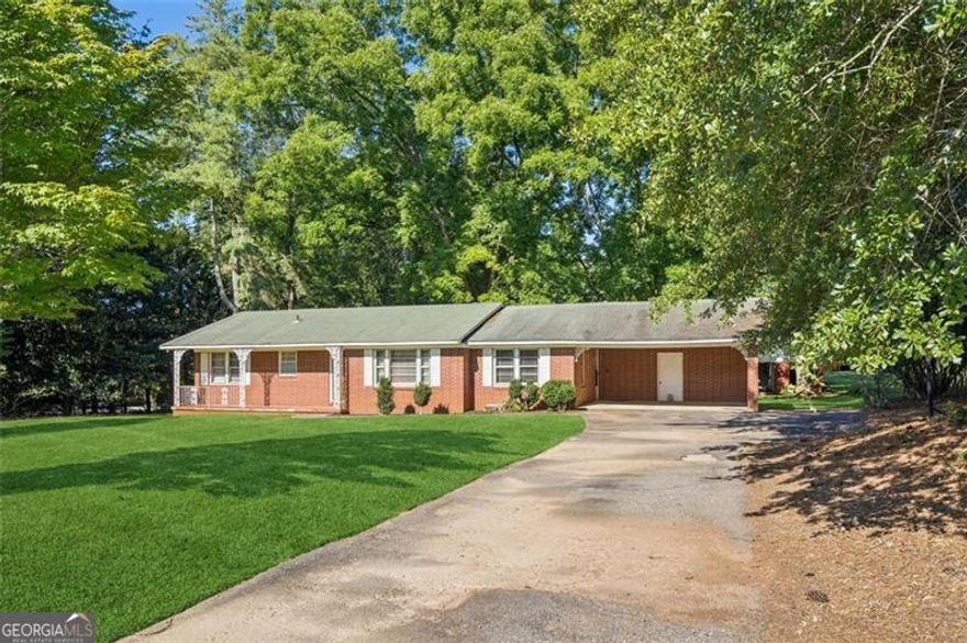1.46 Acre private home site near downtown Alpharetta & Milton, this property offers a rare opportunity to enjoy privacy and space while remaining just minutes to the area's most desirable destinations. Nestled on quite Cowart Road, the land is surrounded by mature trees, open green space and the charm of Milton's equestrian countryside. Located less than 10 minutes to downtown Alpharetta, Avalon, and Crabapple Market, the setting combines the best of both worlds - a peaceful retreat and easy access to premier dining, shopping, and entertainment. The lot also sits within the highly regarded Summit Hill, Northwestern and Cambridge High School districts. Whether you're seeking a site for a custom home, space for outdoor living, or simply an investment in one of North Fulton's most coveted areas, this property delivers both lifestyle and location.