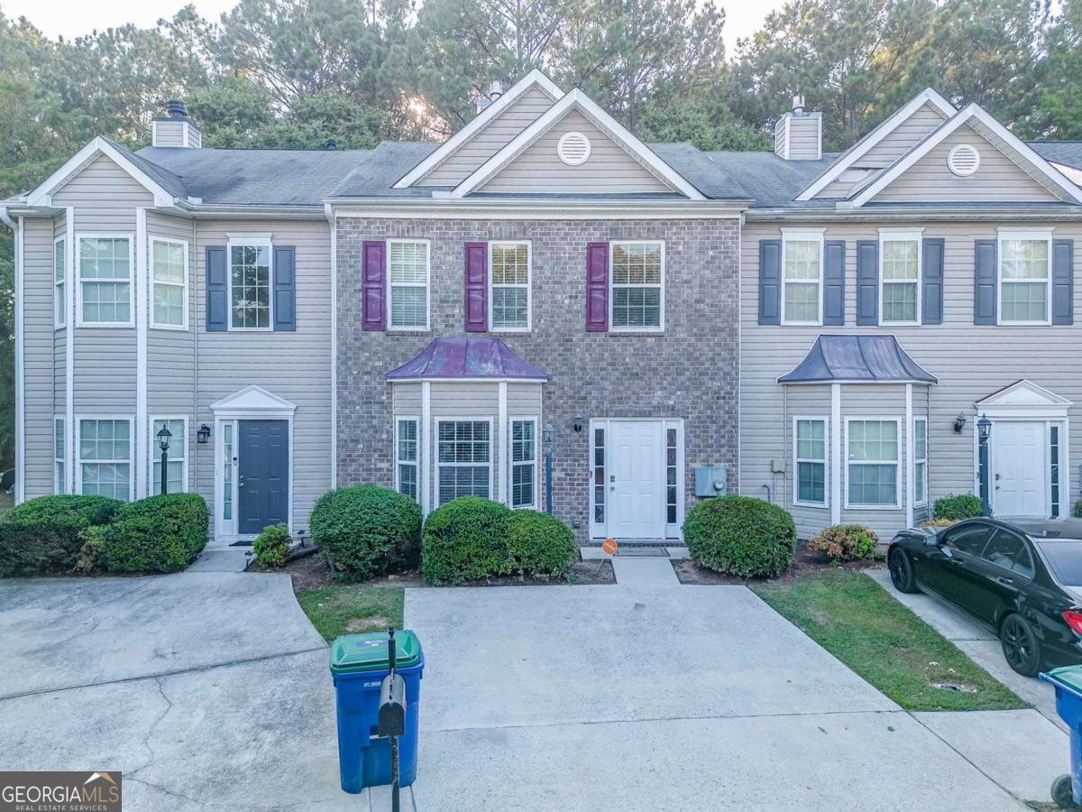 LOCATION! LOCATION! LOCATION! Welcome to this beautifully maintained 3 bedroom, 2.5 bathroom townhome located just minutes from the Hartsfield-Jackson Atlanta International Airport, Camp Creek Marketplace and Fayetteville Pavilion! Step inside to find brand new vinyl floors that flow seamlessly throughout the main level. The spacious eat-in kitchen is a true highlight, featuring stainless steel appliances, granite countertops, and modern finishes-perfect for both everyday living and entertaining. The open layout offers plenty of natural light, while the bedrooms provide comfortable retreats with ample closet space. Enjoy the convenience of being close to shopping, dining, and entertainment, all while living in a move-in ready home at an unbeatable price. Priced under market value you will instantly walk into equity. Don't wait schedule your private showing today! Seller is motivated and all offer will be reviewed!