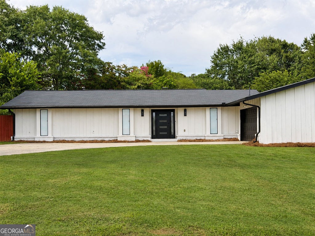 Photo of 2294 SE Fairview Road SE, Conyers, GA 30013 (MLS # 10830167)