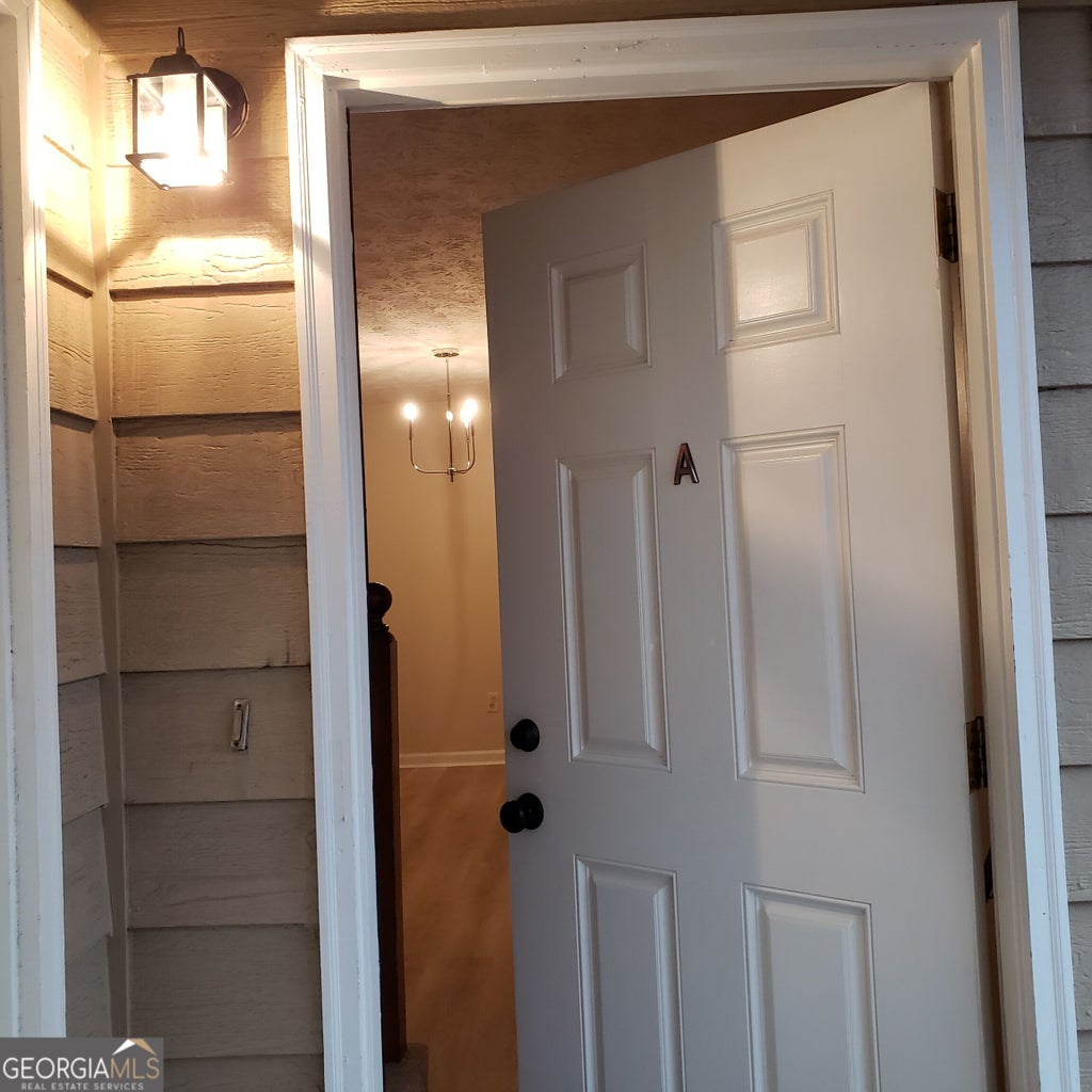 Photo of 5871 N Castlegate Drive #A, Atlanta, GA 30349 (MLS # 10845902)