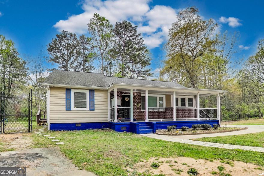Spacious & Renovated 4 Bedroom Home on .77 Acres in Prime Marietta Location! Welcome to this beautifully renovated home in a prime Marietta location near Smyrna! Sitting on .77 acres, this property offers tons of space both inside and out, making it perfect for families, entertaining, and privacy. As you arrive, you'll love the huge front yard, circular driveway for multiple vehicles, and the big front porch perfect for relaxing. Being the last home on the street, you'll enjoy peace and privacy. The fenced backyard has two storage sheds and has been mostly cleared, offering endless possibilities for outdoor fun. Plus, two porches on each side of the home provide great spots for summer barbecues! Step inside to find a completely renovated interior with recessed lighting throughout, hardwood floors, and updated fixtures. The stunning kitchen features quartz countertops, a stylish backsplash, stainless steel appliances, and beautiful cabinetry. The bathrooms have been fully updated, with luxury vinyl flooring, a new vanity, and a ceramic tile stand up shower. The home offers 4 spacious bedrooms and 2 baths, with the master conveniently located on the main level. There are also two living rooms, one of which could easily be converted into another bedroom. Other key features include: 8 year old roof in great condition, Up to date A/C maintenance, 2 year old water heater, Cement siding in excellent shape & Crown molding & fresh paint throughout. Located just 3 minutes from all your favorite restaurants and stores, this extremely well maintained home offers the perfect mix of space, privacy, and convenience. Don't miss out! Schedule your showing today!