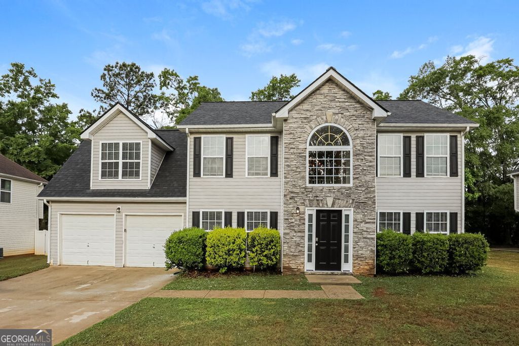 Photo of 419 Grier Drive, Locust Grove, GA 30248 (MLS # 10754408)