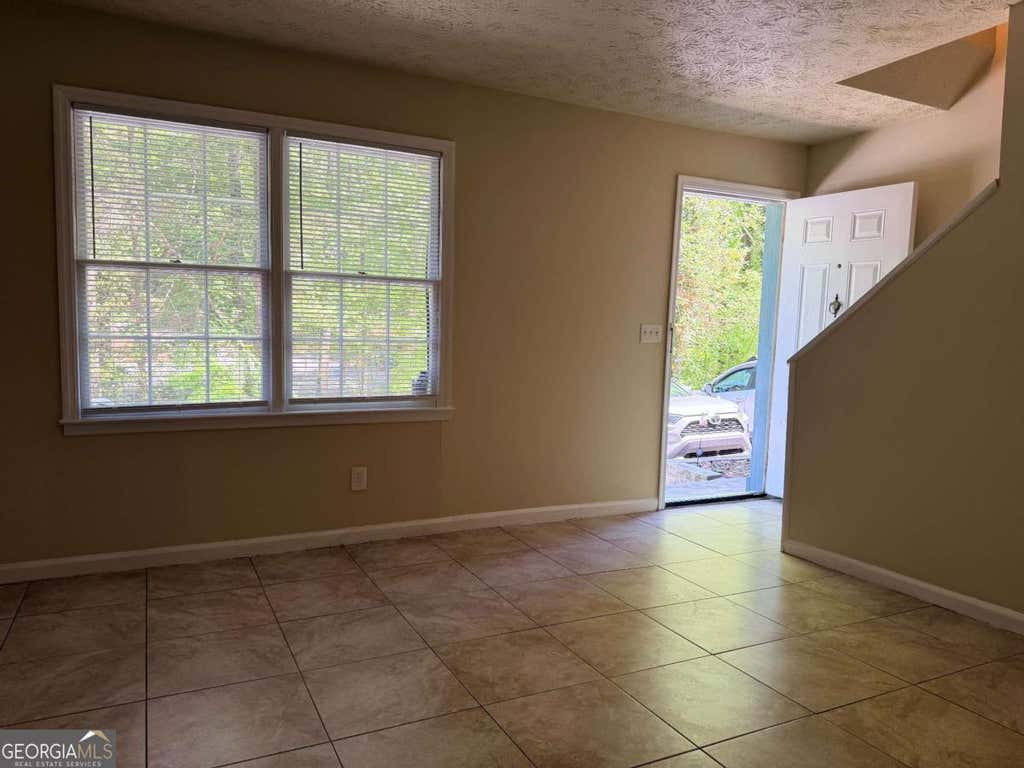 Photo of 728 Burnt Creek Drive NW #B, Lilburn, GA 30047 (MLS # 10776995)