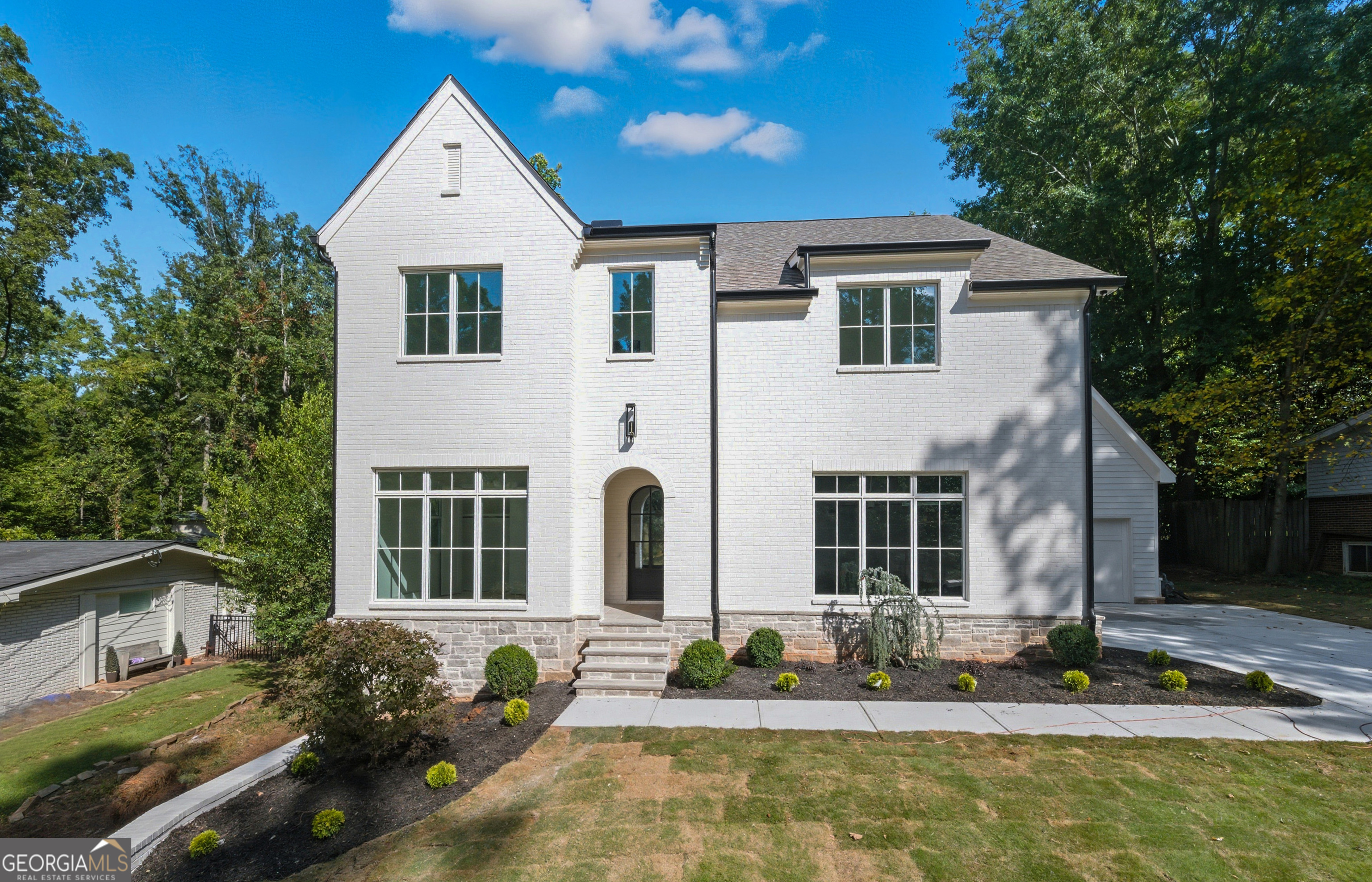 Stunning New Construction by South Crest Homes in the highly desirable Sexton Woods Neighborhood! This 5-bedroom, 4.5-bath luxury residence offers over 3,800 sq ft of living space plus a full unfinished basement, providing endless possibilities! The bright, open floor plan features a designer kitchen with floor-to-ceiling cabinetry, oversized quartz island, and butler's pantry, seamlessly flowing into inviting living room with fireplace and sliding doors to the covered back deck. The main level includes hardwood floors, mudroom, marble-accented powder room, a spacious 3-car garage, office and guest room with full bath. Step outside to a covered back deck with fireplace overlooking a flat, walkout backyard-ideal for entertaining year-round. Upstairs, the primary suite is a private retreat with a spa-inspired bath boasting a huge walk-in shower, separate soaking tub, and custom walk-in closet. Secondary bedrooms are generously sized, with walk-in closets and custom finishes in every full bath. Walking distance to parks, schools, shopping and restaurants!! Don't miss out on this incredible opportunity! The estimated completion of this home is end of October! Interior photos to come once the interior is complete!