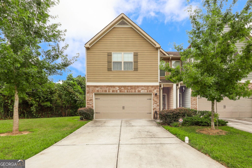 Photo of 7867 Rock Rose Lane, Fairburn, GA 30213 (MLS # 10853930)