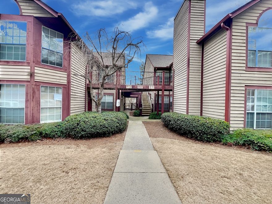 Welcome home to the very best of convenient living in an incredible area! This condo is the perfect turn-key place featuring 2 bedrooms each with its own ensuite bathroom. Spacious and open living spaces provide comfortable living. A cozy fireplace adds to warmth of this great unit. Covered porch is perfect for reading your emails or just sipping coffee. Rivermont is a vibrant community that features a swimming pool, tennis, clubhouse, and beautiful Rivermont Park on the Chattahoochee River.  Strong HOA in order. This location is near everything you could want- Newtown Dog Park, Pickleball courts, Greenway, excellent shopping, and dining. Close to Avalon, Downtown Roswell, and Alpharetta. This is an unbeatable opportunity to get into a vibrant area for an affordable price.