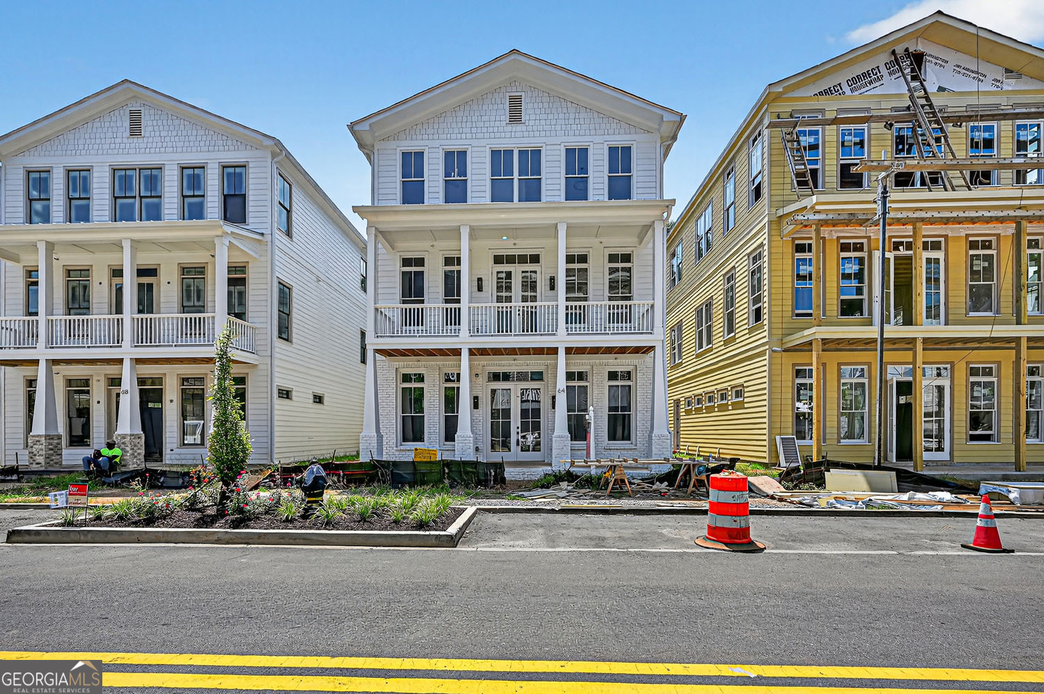 Fantastic opportunity to own a lucrative LIVE/WORK mixed use building! Named by MONEY Magazine as one the top walkable downtown districts in the entire nation, the location is second-to-none with a 5-minute walk to city center downtown Woodstock. Carefully curated choices by the city and local business owners have added extraordinary lifestyle values and the retail options, exceptional eateries, and music venues keep residents and visitors enthralled and engaged. Woodstock is a DESTINATION in and of itself. This amazing property showcases 2 condominium units, 2 Bedroom/2 Bath and a functional Commercial space on the ground floor. Short term rental, long term rental both allowed! Property can be fully owner-occupied, partially occupied or completely leased. Very convenient parking is available in the building's 2-car garage on on the street in front of or behind the building. Subsidize your living or invest to own a piece of prestigious Adair Park!