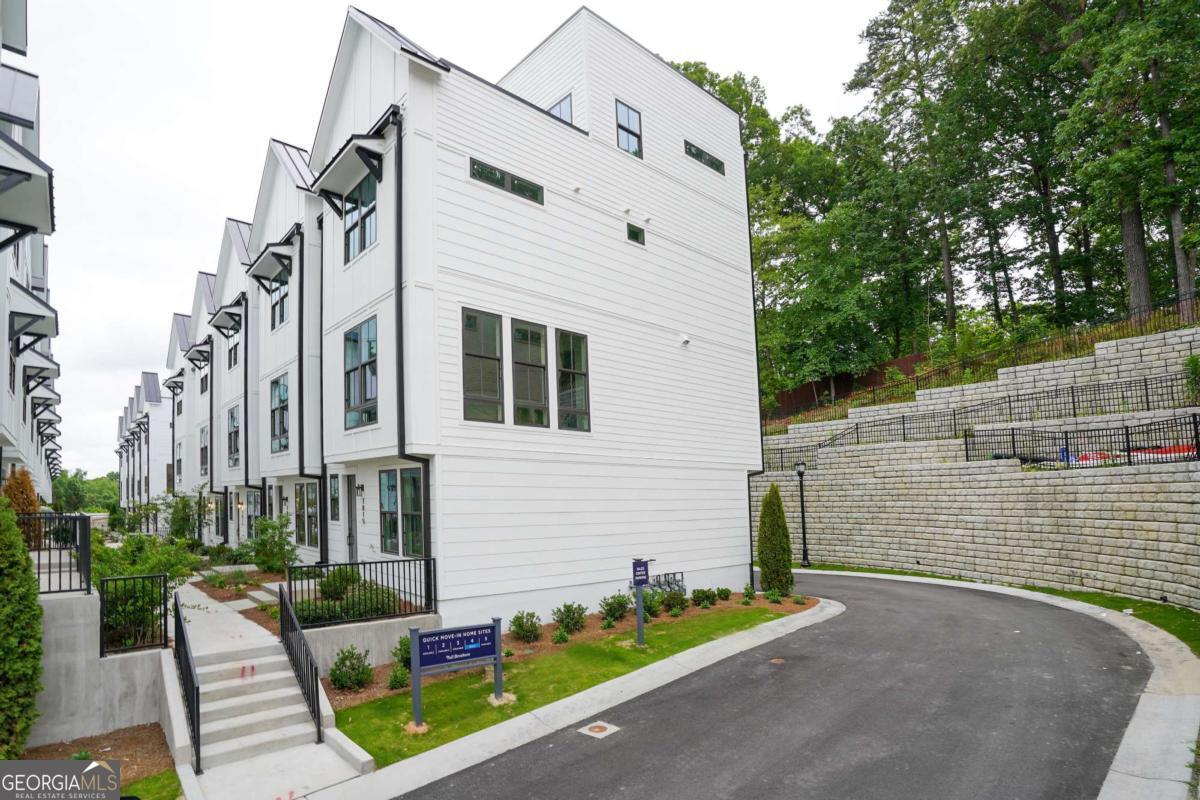 **ASK ABOUT OUR FIRST MONTH SPECIAL!** Wow! In the heart of Morningside, This exceptional four-story townhome offers the perfect blend of modern luxury, architectural sophistication, and unbeatable location. Designed with elegance and functionality in mind, the home features a private entry and two-car garage on the first level, along with a spacious office or guest suite - perfect for professionals or out-of-town visitors. The second floor showcases an expansive open-concept living area with a gourmet kitchen, custom cabinetry, oversized island, and a large family room designed for effortless entertaining. On the third level, you'll find generously sized bedrooms with spa-inspired en-suite bathrooms offering comfort and privacy. The top floor offers a versatile loft-style space ideal for a second office, media lounge, or guest retreat, and opens to a private rooftop terrace with sweeping views of the Midtown skyline. This prime location is just steps away from Piedmont Park, the Atlanta Botanical Garden, the Beltline, VA Highlands, and some of the city's best restaurants, shops, parks, and cultural destinations. This home delivers the ultimate Midtown lifestyle and is a rare opportunity in the rental market. Contact us today for a private showing or more information. Minutes away from Druid Hills, Buckhead, Brookhaven, Midtown, and Ansley Park!