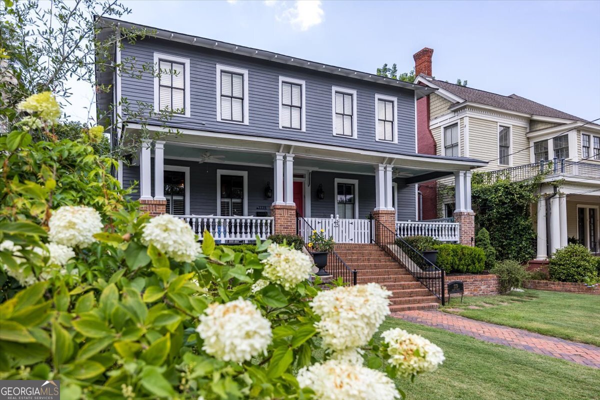 A Masterpiece Renovation of a Fabulous Historic Home updated to Incredible Impeccable Perfection from the very top to the Bottom. This Home Located Overlooking Beautiful Tattnall Square Park with a stroll to the Main Mercer University Campus and a Skip to Wonderful Growing Downtown Macon Georgia captures the Essence of Historical Significance with a ''Cool'' Personality and Awesome Vibe you will Love Entertaining and Relaxing with Friends and Family. This Charming Home Encompasses Everything you want ,Where you want it, with Plenty of Room for Guests and Office Space. A Private Drive gives Access to off Street Parking with a Brick Courtyard Boasting a Beautiful Patio with Outdoor Fireplace for Alfresco Dining. Everything is New! You might Never leave your New Home! (Please see Documents for History of Home and Renovations Completed.