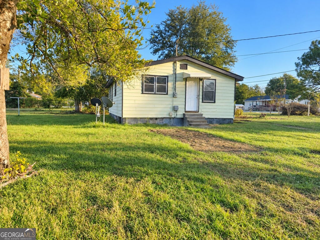 Photo of 407 Attaway Street, East Dublin, GA 31027 (MLS # 10877747)