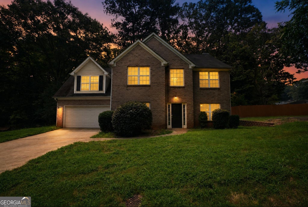 Photo of 5499 Sigman Street, Stone Mountain, GA 30083 (MLS # 10820553)