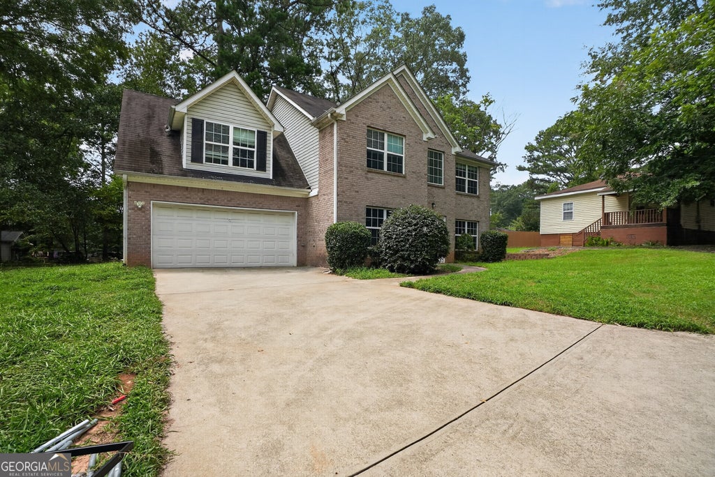 Photo of 5499 Sigman Street, Stone Mountain, GA 30083 (MLS # 10820553)
