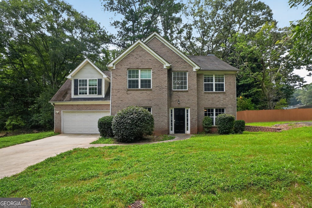 Photo of 5499 Sigman Street, Stone Mountain, GA 30083 (MLS # 10820553)