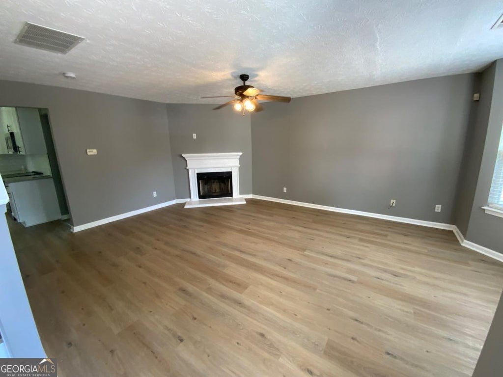 Photo of 6506 CHESTNUT LAKE Crossing, Lithonia, GA 30038 (MLS # 10785887)