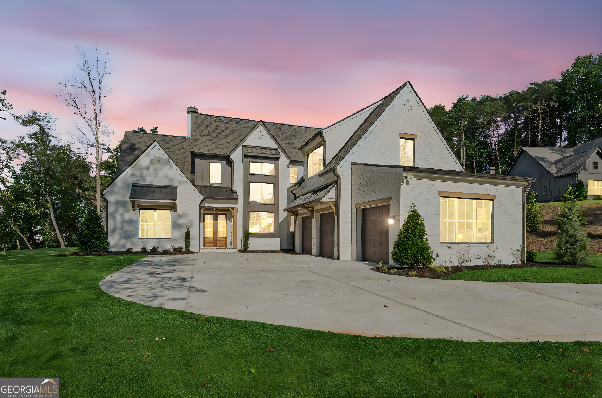 Stunning custom-built home by J. Alan Custom Homes in the new gated community of Pilgrim Mill Farms. Prime location less than a mile to Tidwell Park on Lake Lanier and under 4 miles to GA 400, with top-rated schools, shopping, and dining nearby in the rapidly growing Cumming/North Forsyth area. This elegant home sits on ~2.049 acres and features 4 bedrooms, 4.5 bathrooms, a 3-car garage, and a refurbished barn. The open floor plan includes a main-level owner's suite, spacious scullery, mudroom, upstairs loft, secondary bedrooms, and optional bonus room. Enjoy outdoor living on the 12x42 covered porch with grilling area overlooking a level backyard with room for a pool. High-end finishes throughout deliver a sophisticated, luxury feel. Pilgrim Mill Farms is an exclusive enclave of five estate-size homesites, offering the perfect blend of privacy and convenience. Welcome home! ** Entrance to development is 4395 Pilgrim Mill Rd.