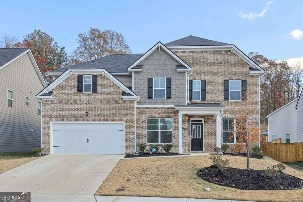 Photo of 1147 Trident Maple Chase, Lawrenceville, GA 30045 (MLS # 10803231)