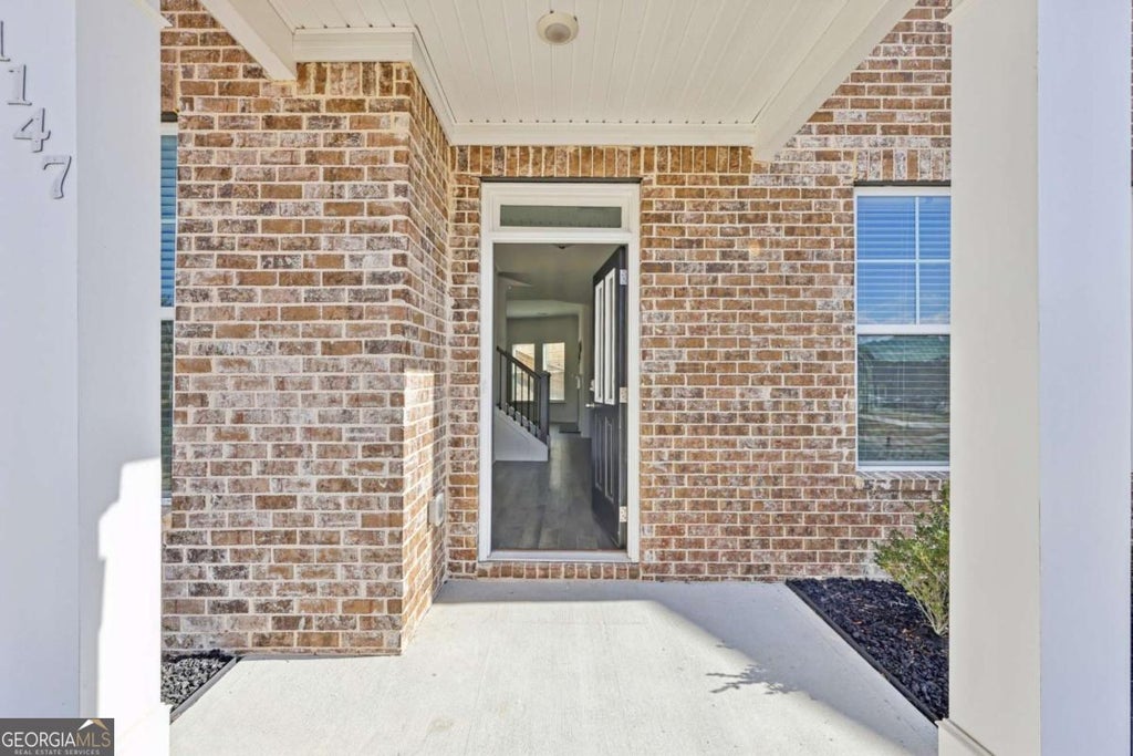 Photo of 1147 Trident Maple Chase, Lawrenceville, GA 30045 (MLS # 10803231)