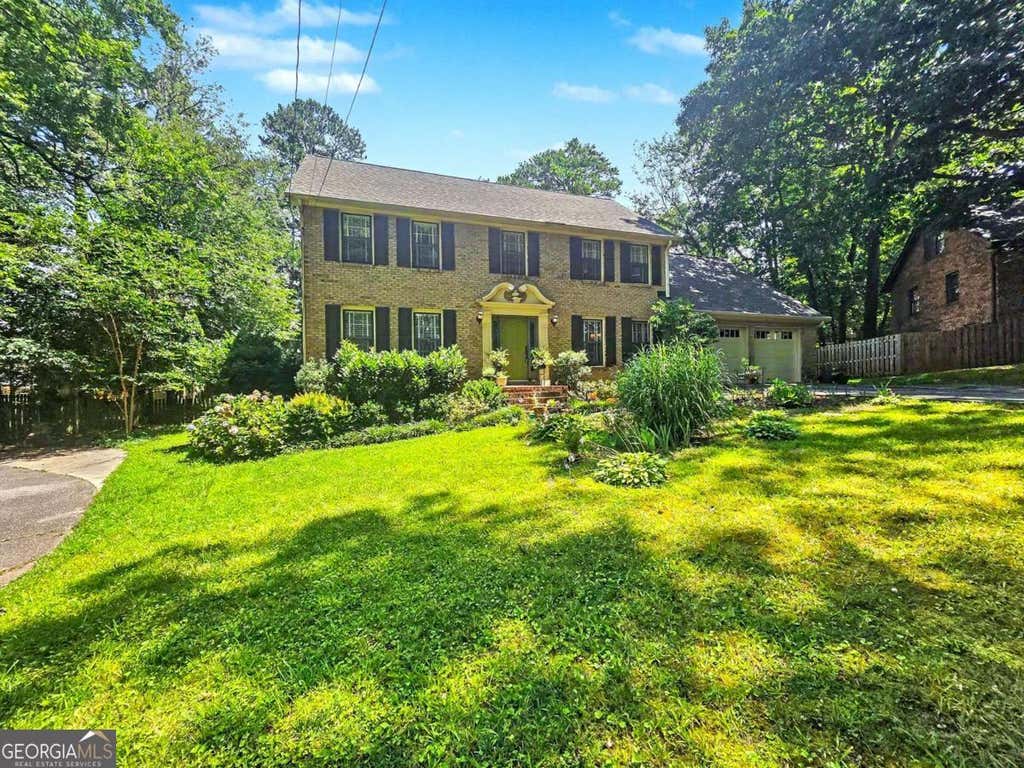 Photo of 886 Ryan Lane SW, Lilburn, GA 30047 (MLS # 10793634)