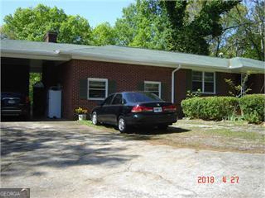 Photo of 7719 Rockmart Hwy, Dallas, GA 30132 (MLS # 10669851)