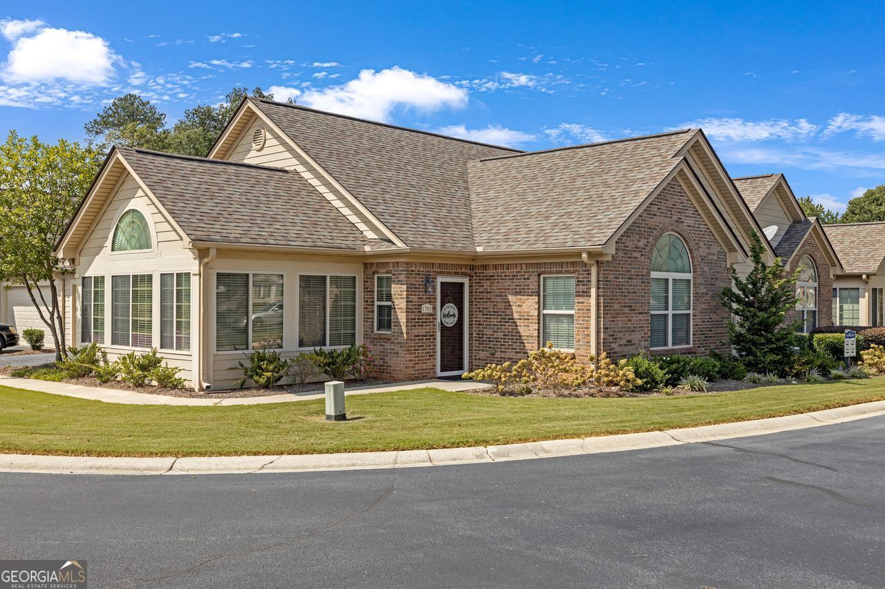 If LOW-MAINTENANCE and CONVENIENT LIVING is your goal, you have found it. This Active Adult community is truly one-of-a-kind in Rockdale County. Welcome to 1701 Silver Summit Dr, a pristine condo in the prestigious, active adult community of Silver Summit that has been completely refreshed! Step inside to discover a bright and move-in-ready haven featuring brand-new carpet, fresh paint throughout, and a sleek new kitchen complete with a matching stove and refrigerator. The low-maintenance lifestyle extends beyond your front door to the community pool, fitness center, and clubhouse for occasional events. Enjoy your retirement knowing everything exterior is maintained by the HOA include water, sewer and trash. This gem combines effortless living with incredible value so you can resize into your forever home. Experience it from home with our 360 virtual tour, then see it for yourself - Join us on Friday, Sept 5, 1.30 -4pm and Sunday, Sept 7, 3-5pm.