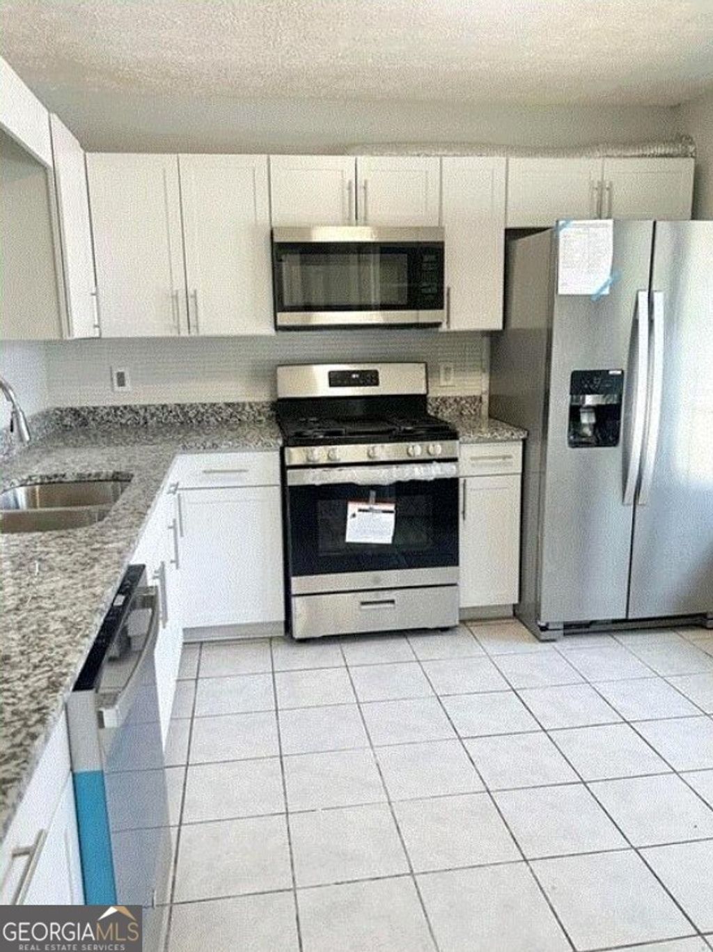 Photo of 1021 Thornwoode Lane, Stone Mountain, GA 30083 (MLS # 10677594)