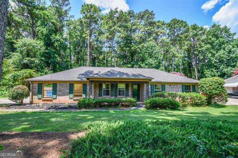 Photo of 1397 Ridgewood Drive SW, Lilburn, GA 30047 (MLS # 10803416)