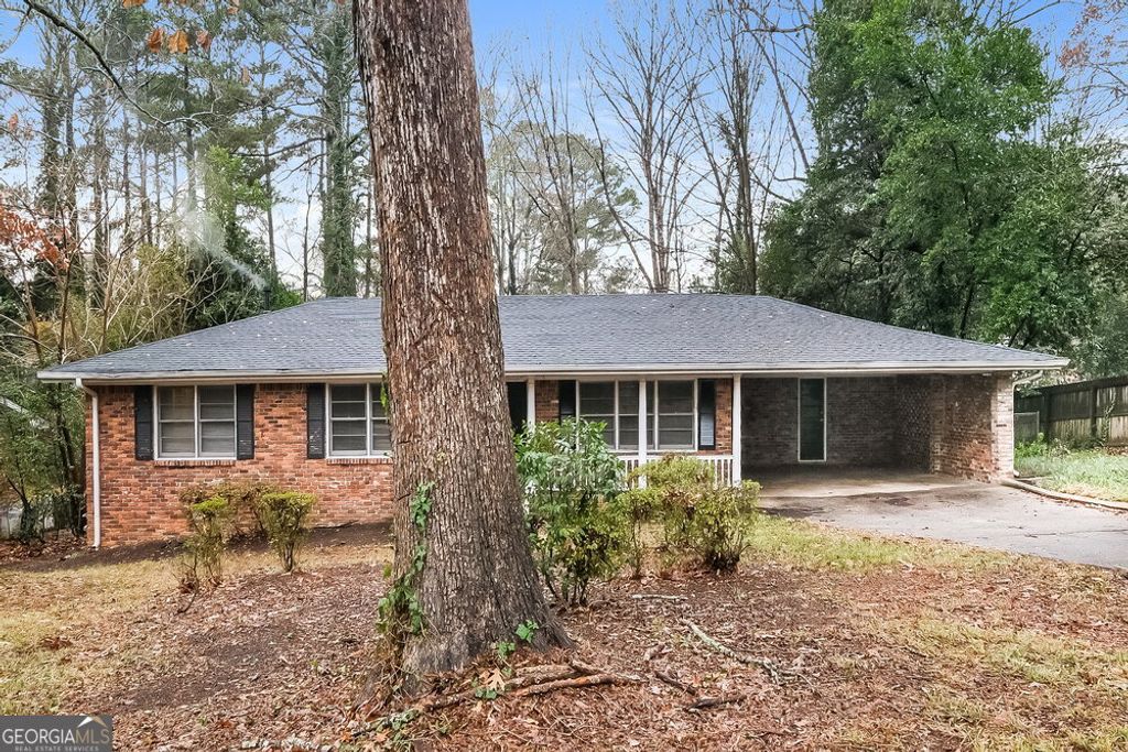 Photo of 1201 Valerie Woods Drive, Stone Mountain, GA 30083 (MLS # 10654872)