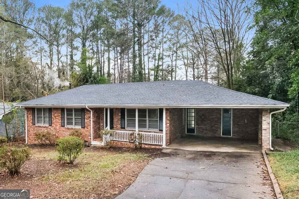 Photo of 1201 Valerie Woods Drive, Stone Mountain, GA 30083 (MLS # 10654872)