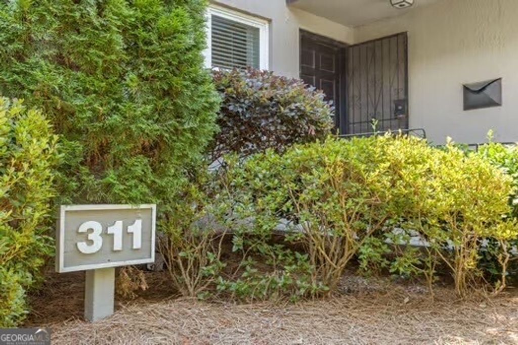 Photo of 311 Lakemoore Drive NE #C, Atlanta, GA 30342 (MLS # 10663116)
