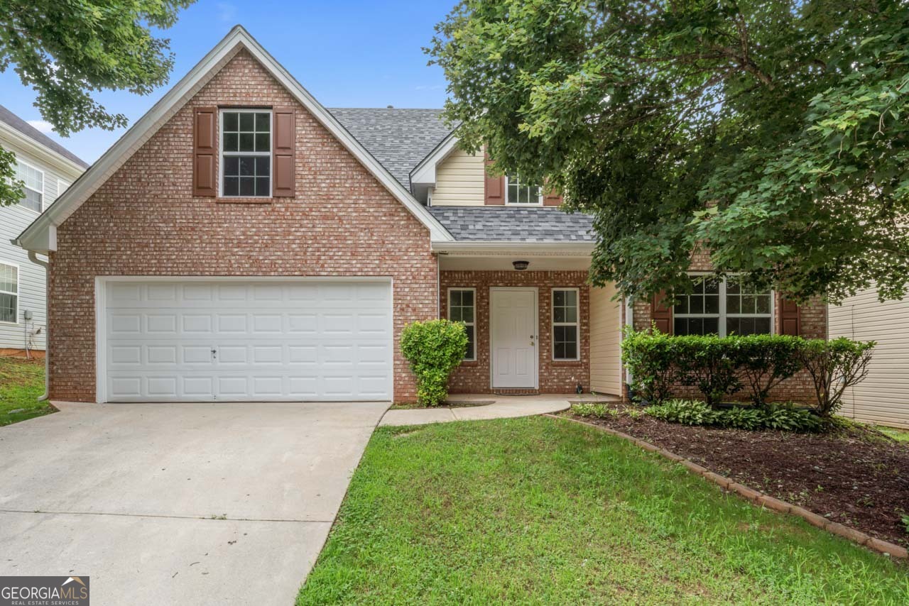 Welcome to Your Ideal Locust Grove Home! This beautifully updated 4-bedroom, 2.5-bath home offers the perfect blend of comfort, convenience, and style. Built in 2006 and freshly updated with new paint and carpet throughout, this two-story gem features a spacious primary suite and laundry room on the main level-a rare find that makes everyday living effortless. Step inside to an inviting open foyer with vaulted ceilings, filling the home with natural light. The main level also boasts a formal dining room, a cozy eat-in kitchen, and a separate breakfast bar area, providing plenty of space for meals, gatherings, or morning coffee. Upstairs, you'll find three generously sized secondary bedrooms, perfect for family, guests, or a home office. The garage has been freshly painted and finished with a non-slip floor coating for added function and style. Located in the heart of Locust Grove, this home is just a short walk to Tanger Outlets and local shopping and dining-you'll love the convenience of this vibrant, walkable neighborhood. Don't miss your chance to own this move-in ready home in an unbeatable location!