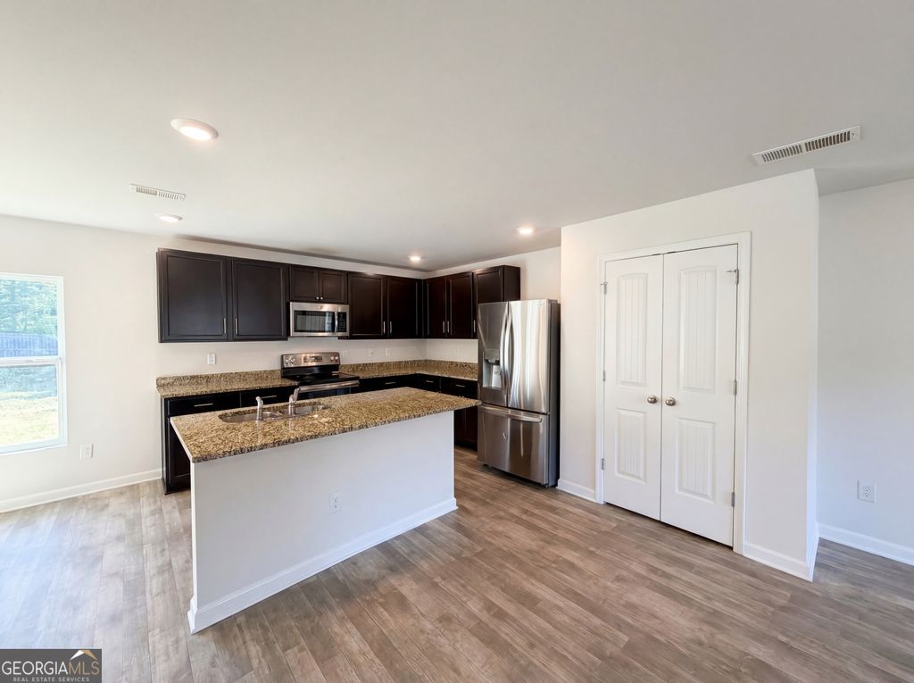 Photo of 1355 Mills Cove Drive, Covington, GA 30016 (MLS # 10731418)