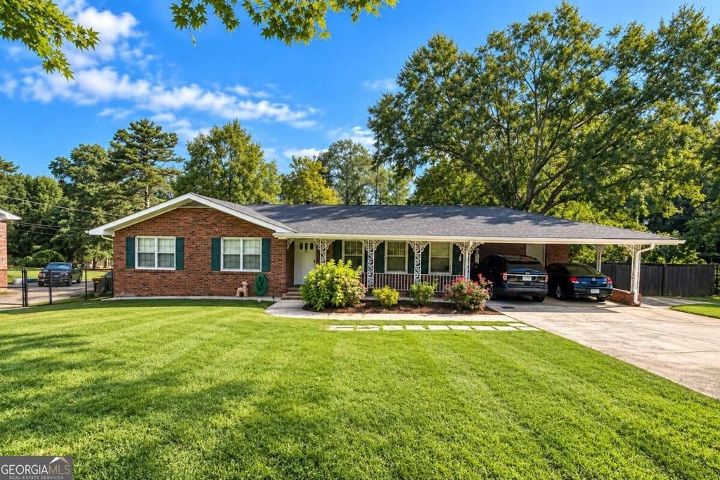 Photo of 304 Fayetteville Road, Fairburn, GA 30213 (MLS # 10847271)