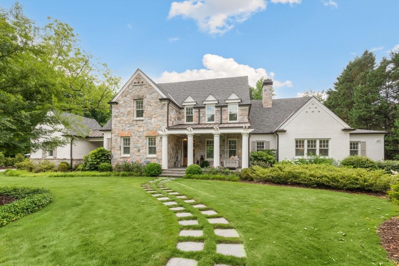 A stunning masterpiece! A custom builder's personal home with no details overlooked. The first floor features 8" wire brushed white oak floors throughout, high end lighting, hand carved lime stone fireplace, custom built floor to ceiling steel windows and doors overlooking a large covered porch, vanishing edge salt water pool and private back yard giving it a true indoor/outdoor feel. Kitchen features two sub zero refrigerators, commercial grade 48" blue star range and custom zinc hood. A large prep pantry includes a standalone freezer, pellet ice maker and french door blue star oven. This home is made for entertaining. Second floor features three oversized bed rooms with one room considered a second master suite. Basement includes a gym, kitchenette, theatre and billiards room. Detached office space is perfect for working from home and features custom built-ins, wet bar and full bath. 100% spray foam insulation. This is a must see!