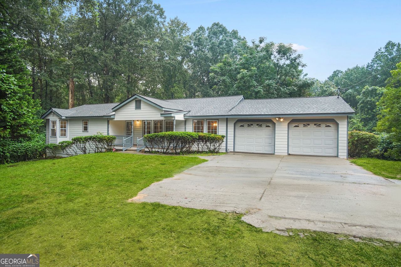 **Fully Renovated Ranch Home on 3+ Acres - Move-In Ready!** Welcome to your dream home in Atlanta! This beautifully renovated 4-bedroom, 3-bath ranch sits on over 3 acres of land-offering the perfect mix of privacy, space, and modern comfort. Everything in this home is brand new: roof, HVAC, kitchen, bathrooms, flooring, and fresh paint inside and out. The open layout features a spacious living area, updated kitchen with stainless steel appliances and quartz countertops, and three stylishly upgraded bathrooms. With four generously sized bedrooms, there's plenty of room for family, guests, or a home office. Step outside and enjoy the peace and privacy of your expansive lot-perfect for outdoor entertaining, gardening, or future projects. A 2-car garage adds convenience and extra storage. Additionally, it has a carport and a big storage in the backyard. Located just minutes from shopping, dining, and major highways, this move-in-ready home offers the rare combination of modern updates and acreage-all within city reach. Don't miss this one-of-a-kind property-schedule your tour today!