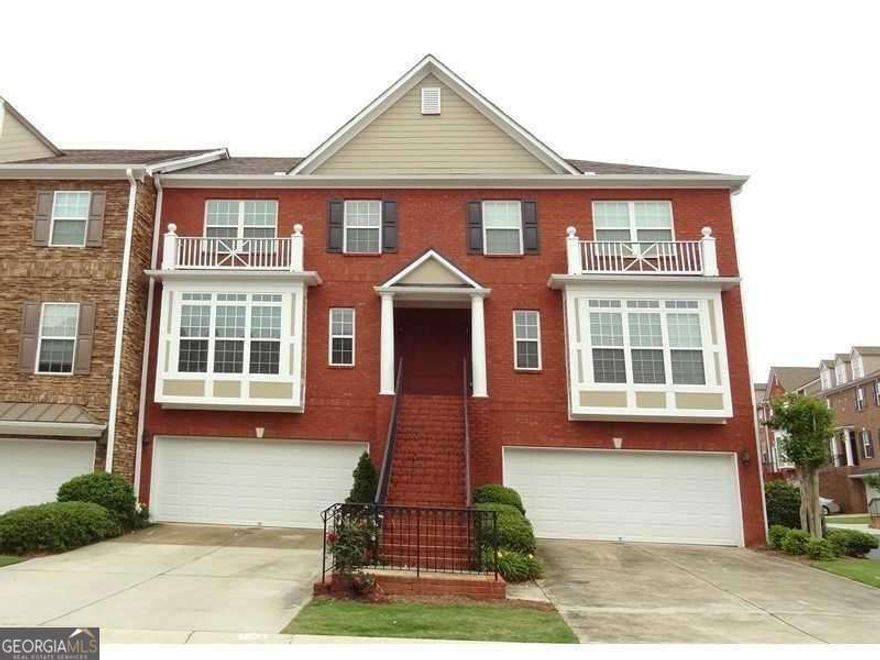 Welcome to 6173 Briggs Way, a beautifully maintained 3-bedroom, 2.5-bathroom end-unit townhome located in the highly sought-after gated community of Abbotts Bridge Place in Johns Creek. This spacious three-level home features a light-filled family room with a fireplace, hardwood floors throughout the main level, and a large kitchen with an island, granite countertops, stained cabinets, pantry, and stainless steel appliances including a gas range, range hood, refrigerator, dishwasher, and washer/dryer. The upper level boasts a generous primary suite with a tray ceiling, walk-in closet, soaking tub, separate shower, and double vanity. Enjoy a finished basement, private deck, and a two-car garage. Community amenities include two swimming pools, splash pad, clubhouse, 12 tennis courts, 2 pickleball courts, playground, indoor gym, and tennis pro programs. Conveniently located in the top-rated Northview High School district and within walking distance to schools, shops, and dining.