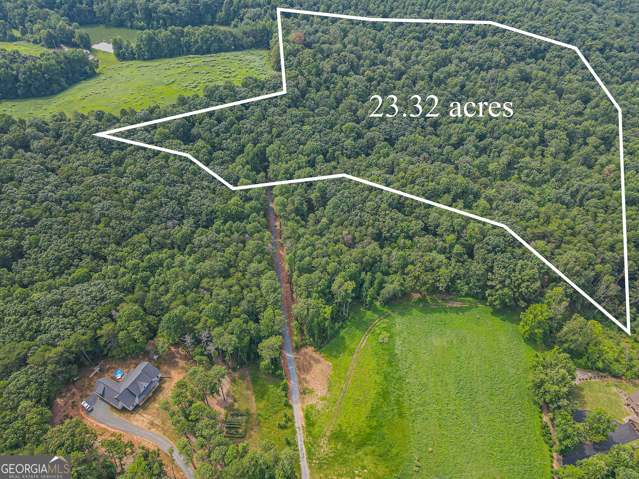 23.32 Acres of Beautifully, Untouched, Rolling hills in the heart of Wine Country. This property has enough acreage for your family compound or private mountain retreat. Minutes away from Chateau Meichtry, Buckley and Ott Farms Vineyards. Get your fresh food from Mountain Valley Farm Store and Harvest Moon Farms, which are right down the road. Whether you're an Outdoor Enthusiast who loves to fish, kayak and go tubing, or you love great shopping and dinning this property is in a prime location to do it all. Within 10 minutes from downtown Ellijay this property has minimal restrictions. Be the next owner of this great opportunity, come tour today!! Trusted Lender Homeowners Financial Group Casey Simmons.