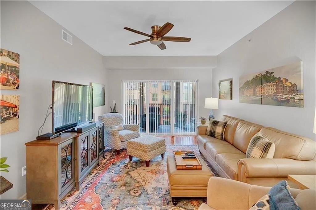 Welcome to your urban retreat at One River Place, a premier condominium community beautifully landscaped on 33 acres, surrounded by woodland forests - a true HIDDEN GEM. Perfectly positioned near Truist Park - The Battery, Chastain Park, premier shopping and dining, and the vibrant neighborhoods of Buckhead, Sandy Springs, and Cumberland. Also, Top Rated Schools Enjoy easy access to I-75, I-285, and GA400. Just a quarter mile from the Chattahoochee River National Recreation Area - ideal for peaceful walks, invigorating bike rides, or simply reconnecting with nature. Community amenities are second to none, featuring guarded, gated entrances, 24-hour security, concierge service, a clubhouse with two saltwater pools, a fitness center, a dog park, walking trails, and multiple lush green spaces perfect for relaxing or gathering with neighbors. This fourth-floor corner unit offers an open floor plan and a rare double sized covered balcony, a perfect spot to enjoy your morning coffee. You will find two nicely sized bedrooms with generous closet space, beautiful hardwood floors, fresh bedroom carpeting, elegant, tiled bathrooms, stylish updated lighting, and attractive window treatments. Additional features include FREE like-new deluxe washer and dryer, two owned/assigned parking spaces, and a custom wood storage system in the master closet. There's even room for a computer/office alcove - perfect for work-from-home days. This is more than just a condo - it's a place to truly feel at home. NEW CENTRAL A/C! 5 YEAR WARRANTY! EXTERIOR (OF ALL BUILDINGS) RECENTLY CLEANED AND PAINTED. A MUST SEE - and it won't last long!
