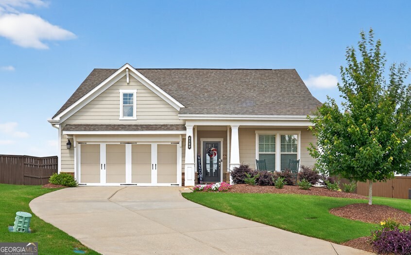 Arguably having one of the best views in Forsyth County and situated on a cul-de-sac lot, at nearly 2400 square feet, this meticulously maintained 3 bedroom + 3 full bathroom home has so much to offer! Just step inside, and take a look for yourself! On the main level, you will find the primary suite as well as a secondary bedroom, full bathroom, laundry room, and an office. Additionally, the main level offers an open concept with a gorgeous kitchen including plentiful cabinet space, stainless steel appliances, granite countertops, and a large island overlooking the dining and living areas. The living area includes built-ins surrounding the stone facade fireplace as well as a mounted TV which is remaining with the property! The second level offers a third bedroom, a full bathroom, as well as an oversized bonus room with a multitude of options for use of the space. Finally, from the main level, step outside to the backyard oasis. The stunning custom-built screened-in patio (which is also equipped with a custom-built doggie door perfect for any furry family members to easily access the fenced-in yard) includes two ceiling fans as well a mounted TV which is also staying with the property. It gets better...the views from this home are absolutely breathtaking. Enjoy the unobstructed, gorgeous sunset views regularly while also enjoying the comfortable outdoor living space. Also, there's no need to travel to see fireworks on holidays. From this home, you are able to view local firework shows. Again, this east-facing home has arguably one of the best views in the county! Additionally, the Grandview Manor community offers amenities which include a swimming pool, a playground, and a firepit. Located in the top-rated Forsyth County Schools district, the property is conveniently located near restaurants, shopping, local parks, GA-400, and much more.