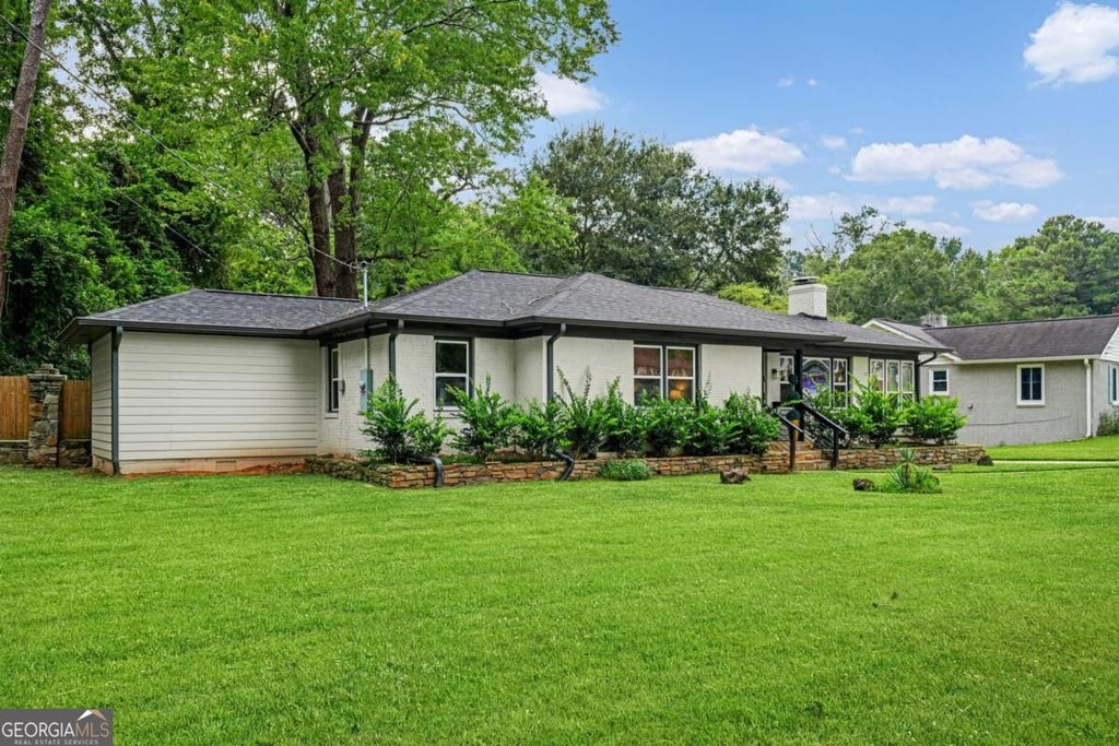 Photo of 1340 Downs Drive SW, Atlanta, GA 30311 (MLS # 10830100)