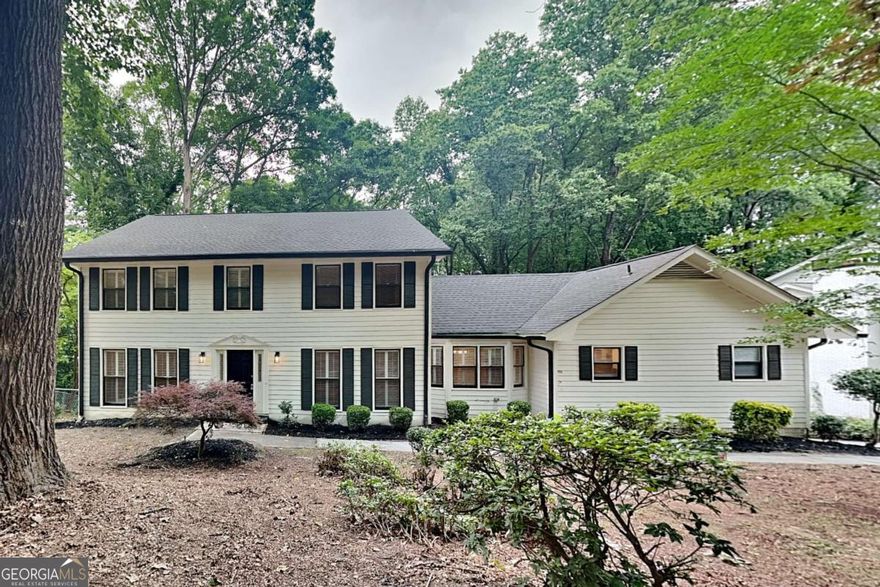 247 Millbrook Farm Rd, Marietta, GA 30068    Discover your dream home in this beautifully updated and maintained traditional-style home. This 5-bedroom, 4.5-bathroom gem offers approximately 4,488 square feet of thoughtfully designed living space.    Property Highlights:  * Inviting open floor plan with seamless flow between living spaces  * Large living room featuring a cozy fireplace  * Spacious kitchen boasting granite countertops, stainless steel appliances, large island with seating, and ample cabinet space  * Generous master retreat with luxurious en-suite bathroom and walk-in closet  * Gleaming hardwood floors throughout main living areas  * Attached two-car garage    Step outside to your private backyard and deck, perfect entertaining. The fenced and wooded lot provides a sense of privacy and serenity.    Situated in an established neighborhood, this home grants easy access to schools, shopping destinations, and dining options. Enjoy quick commutes via nearby roadways and highways, putting you just moments away from all the area has to offer.    Don't let this opportunity slip away - schedule your private tour today and make this house your home!