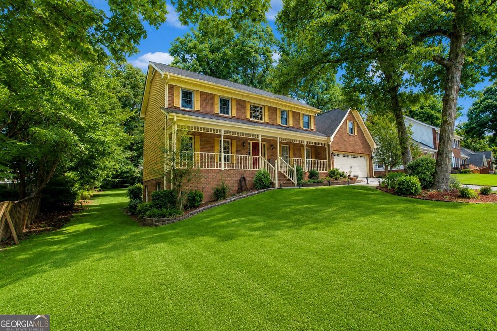 Photo of 5817 Lost Grove Drive NW, Lilburn, GA 30047 (MLS # 10794075)